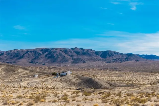 a view of ocean and mountain