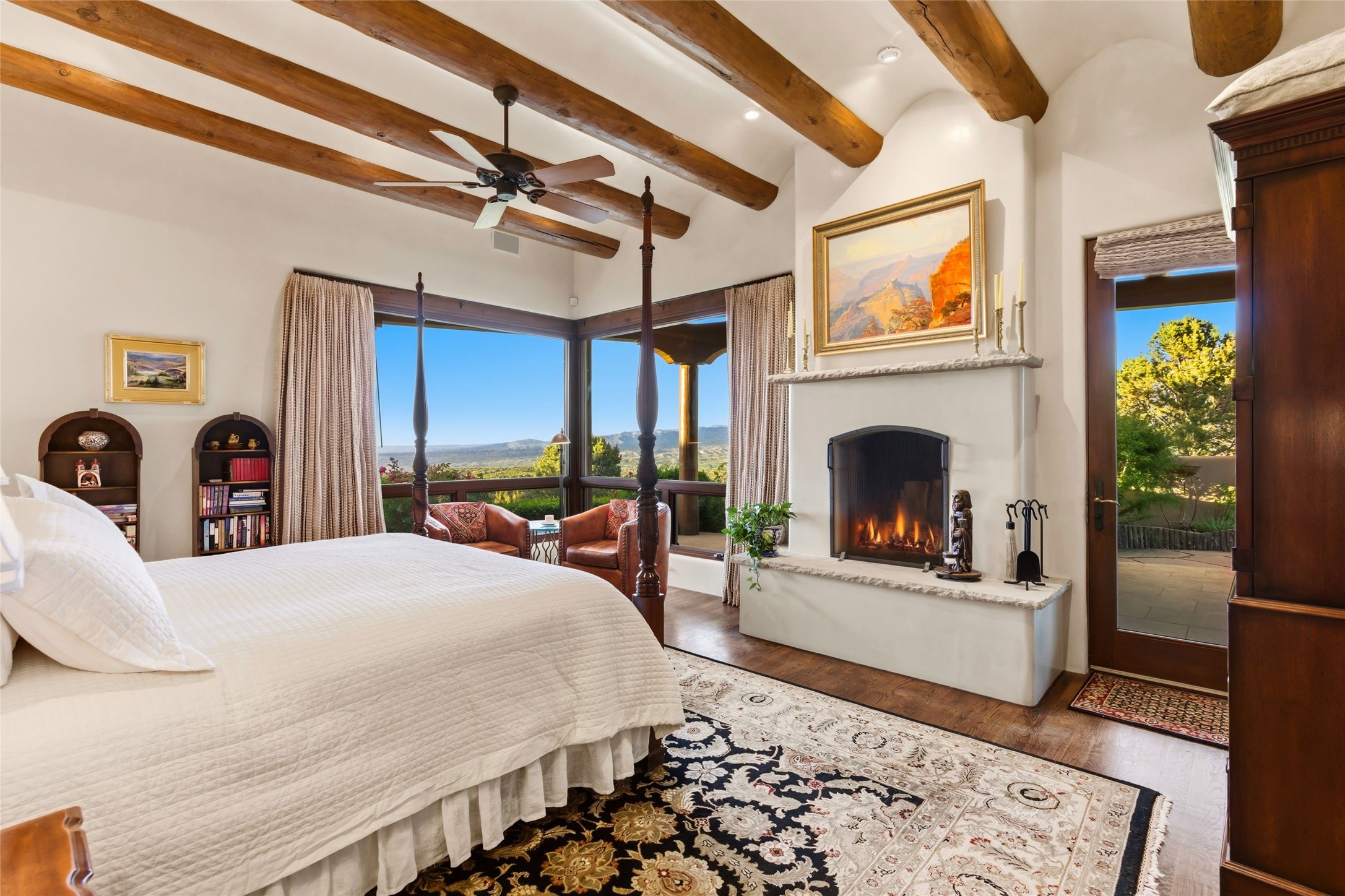 42 San Juan Ranch Road Santa Fe, NM 87506 - Photo 5 of 49 Primary Bedroom Suite with Fireplace and Portal access