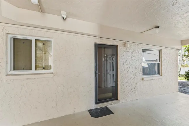 wooden floor and window in an empty room