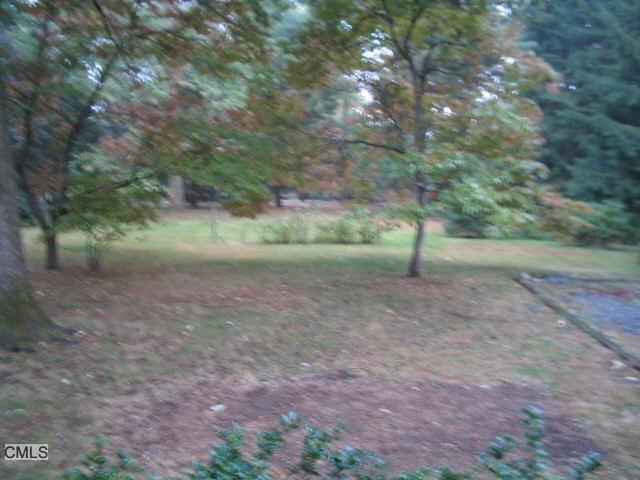79 Dayton Road Redding, CT 06896 - Photo 1 of 1 a view of a yard with a tree