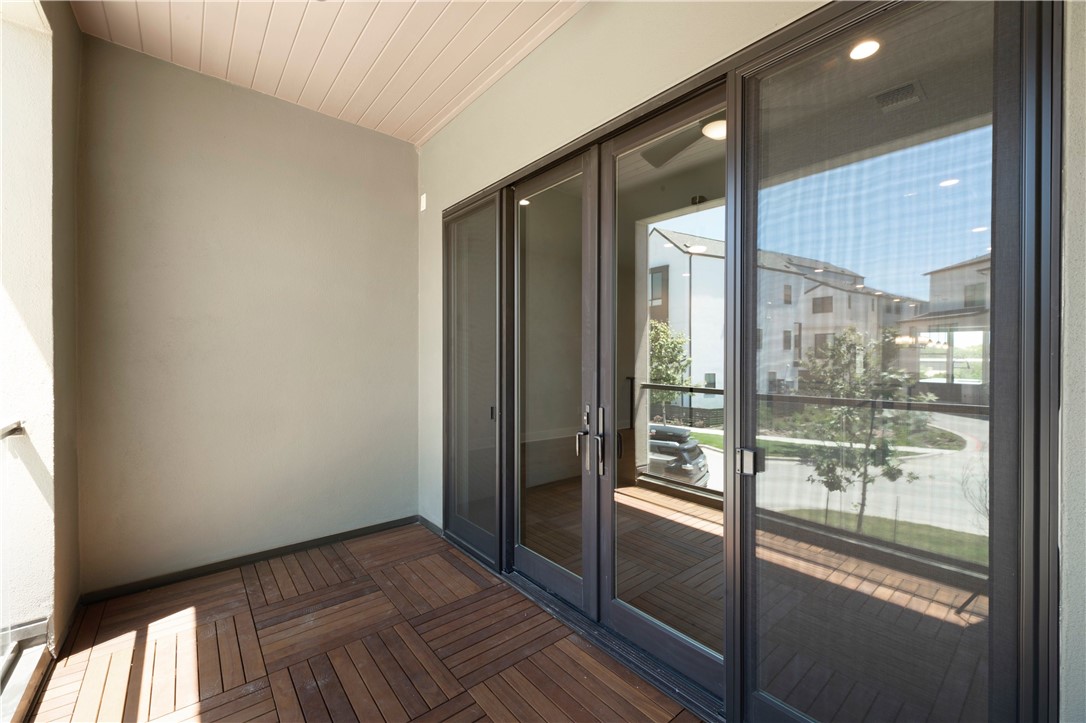 4611 Unity Circle Austin, TX 78731 - Photo 10 of 40 Another view of the covered balcony.