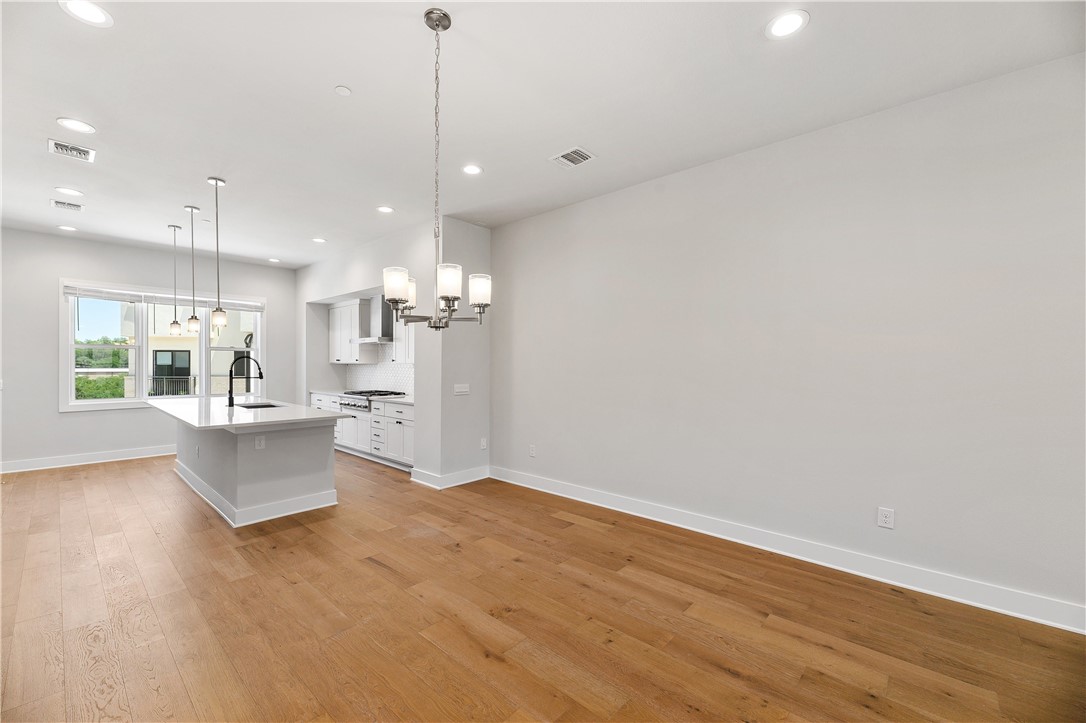 4611 Unity Circle Austin, TX 78731 - Photo 13 of 40 Dining area and gourmet kitchen