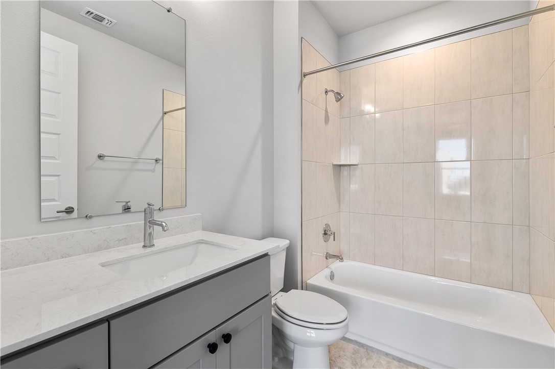 4611 Unity Circle Austin, TX 78731 - Photo 27 of 40 Private bath for bedroom number two.