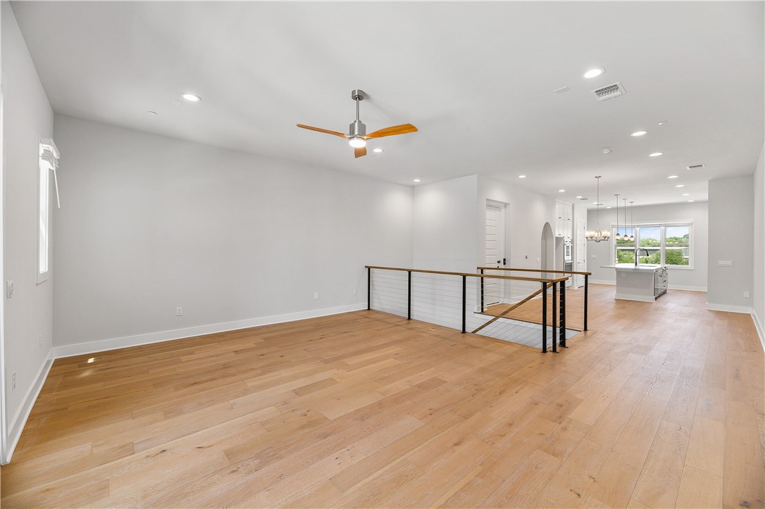 4611 Unity Circle Austin, TX 78731 - Photo 3 of 40 Large living room that is open to the gourmet kitchen. Perfect for entertaining!