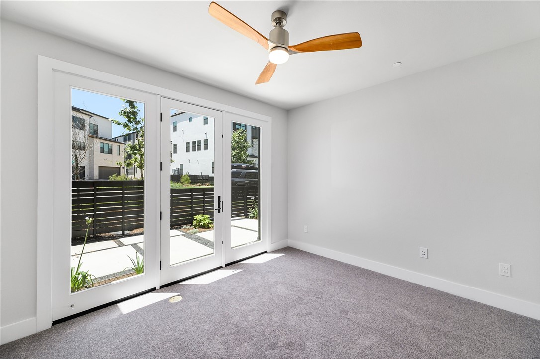 4611 Unity Circle Austin, TX 78731 - Photo 33 of 40 First floor bedroom- great for guests, a home office, workout spot, you name it!