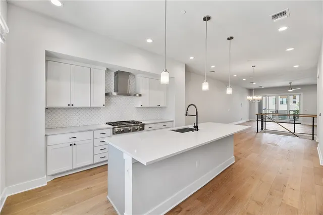 a view of a brick building with many windows