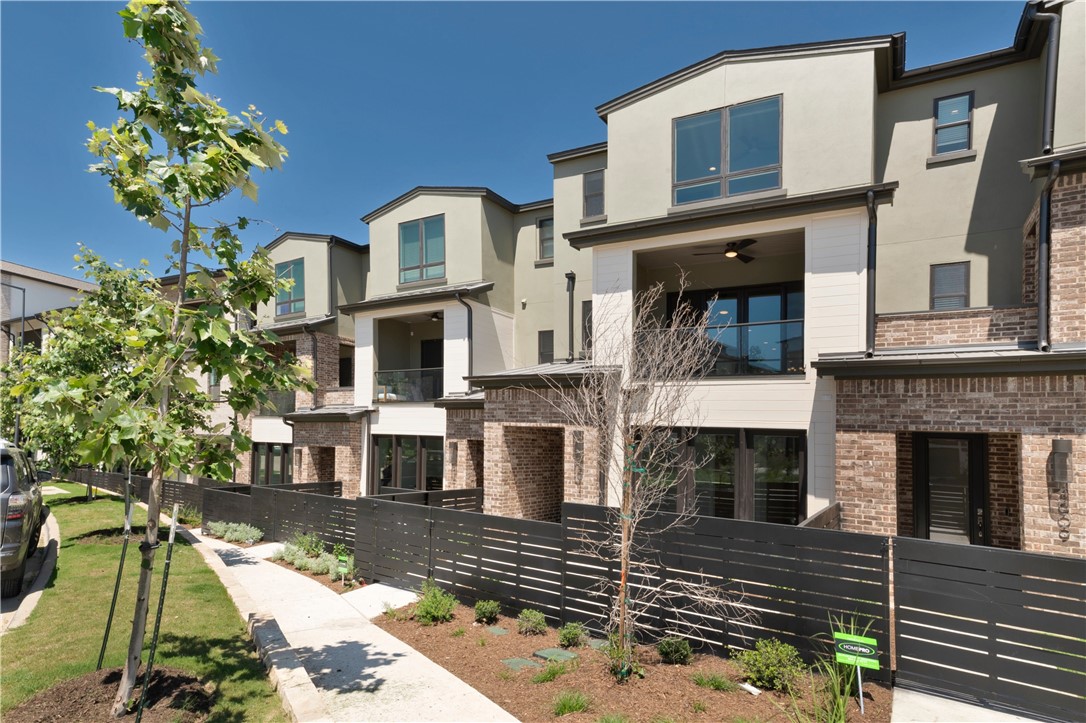 4611 Unity Circle Austin, TX 78731 - Photo 5 of 40 This home front Lacey Cup Lane. The rear-entry two car garage is on Unity Circle.