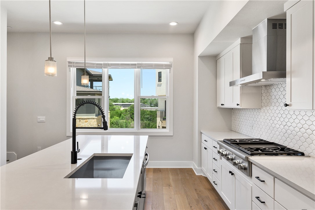 4611 Unity Circle Austin, TX 78731 - Photo 6 of 40 Don't miss the views from the kitchen window.