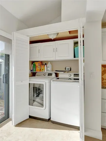 a picture of a wall with a white building