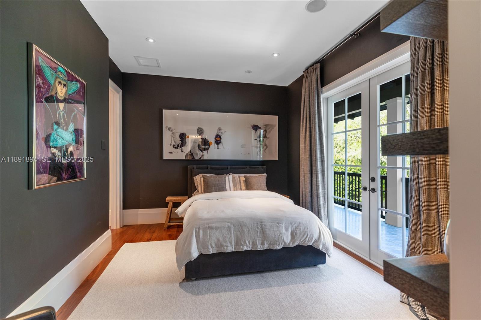 8150 School House Road Miami, FL 33143 - Photo 20 of 27 a bedroom with a large bed and a large window