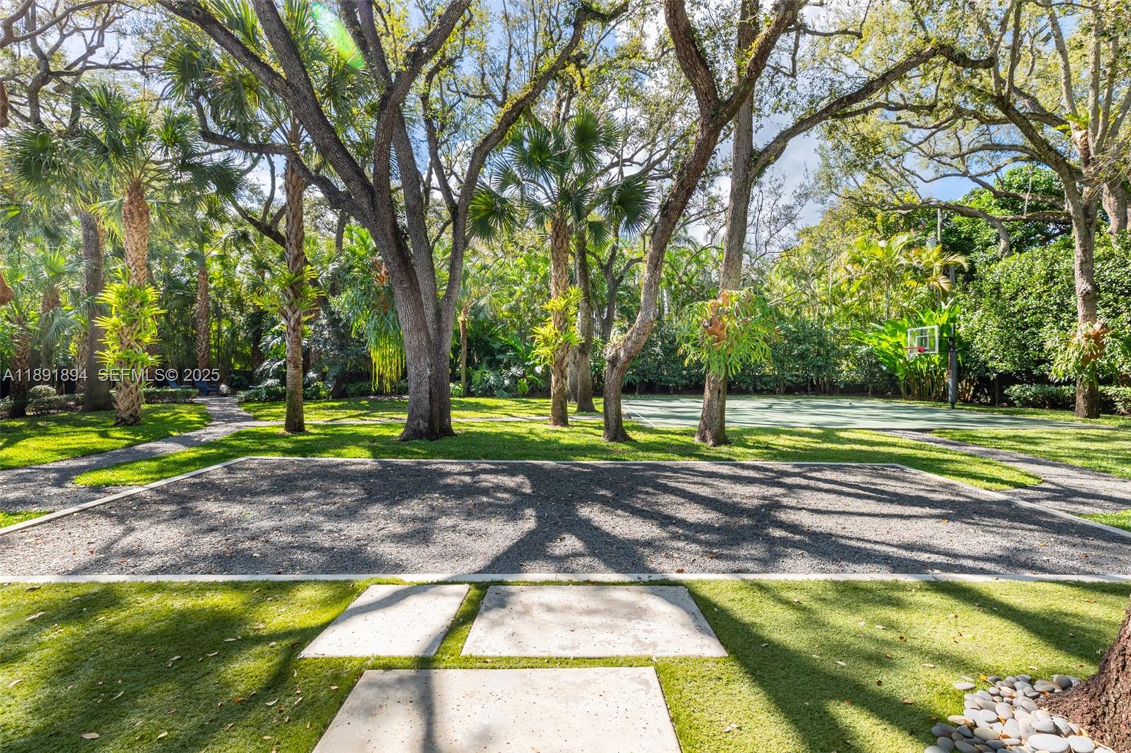8150 School House Road Miami, FL 33143 - Photo 25 of 27 a view of a swimming pool with a yard