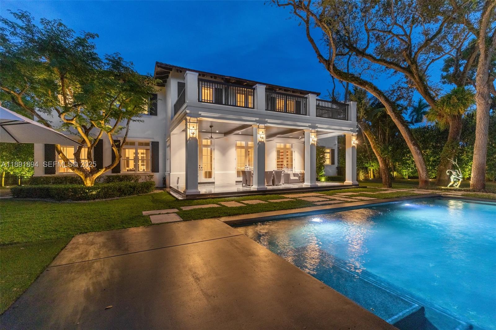 8150 School House Road Miami, FL 33143 - Photo 27 of 27 a view of pool with house in background