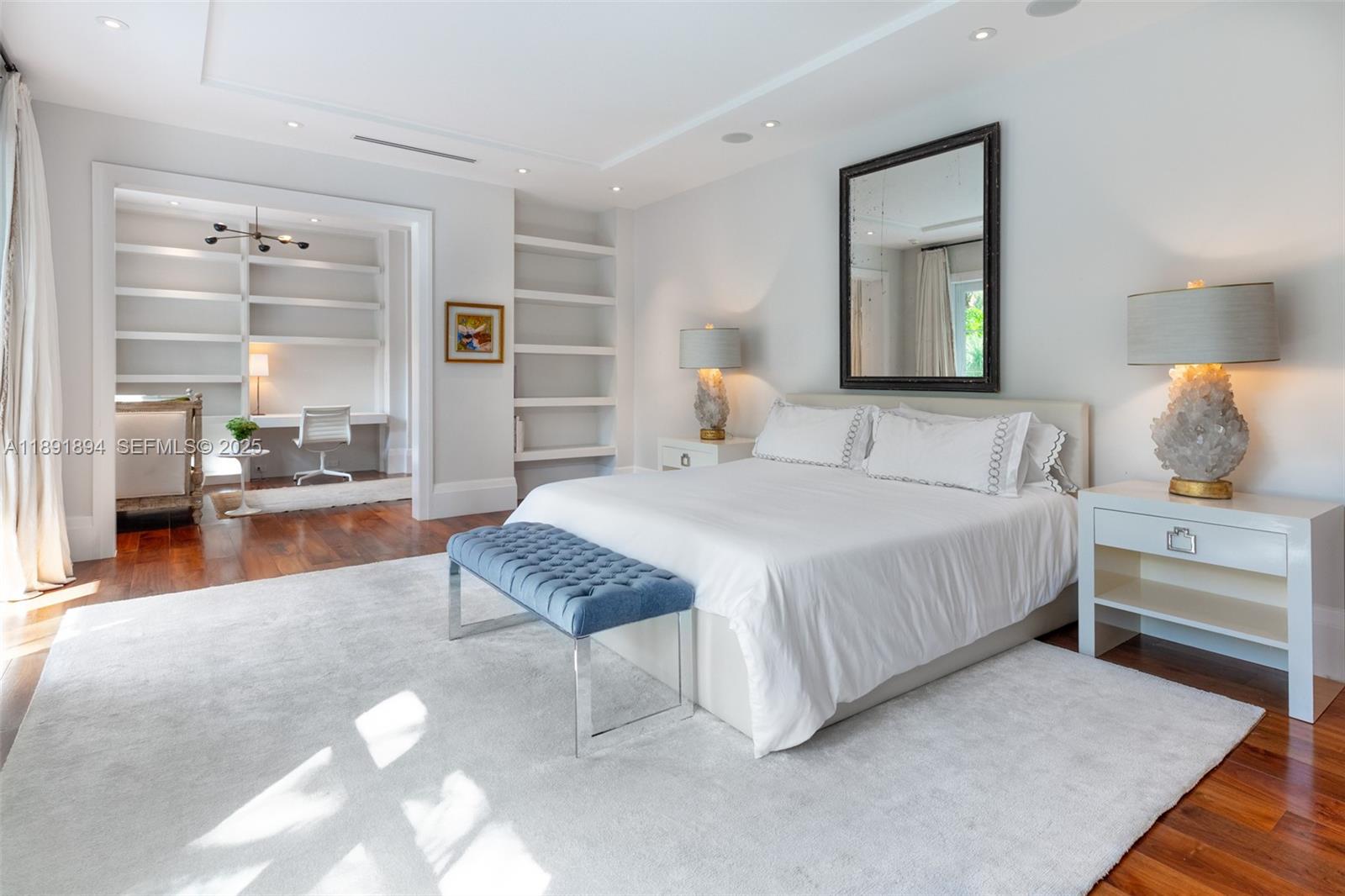 8150 School House Road Miami, FL 33143 - Photo 9 of 27 a spacious bedroom with a bed and a cabinets