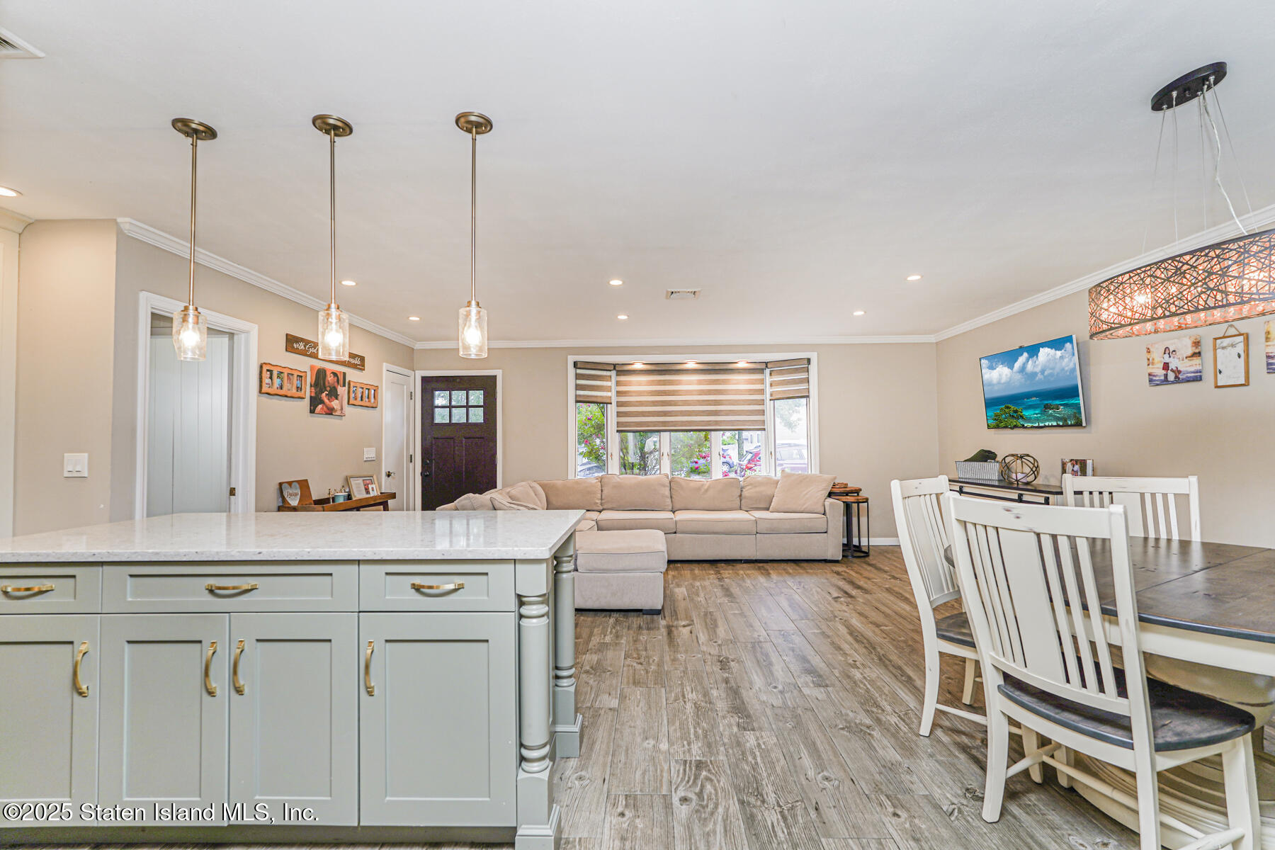82 Woods Of Arden Road Staten Island, NY 10312 - Photo 12 of 30 a living room with furniture and a wooden floor