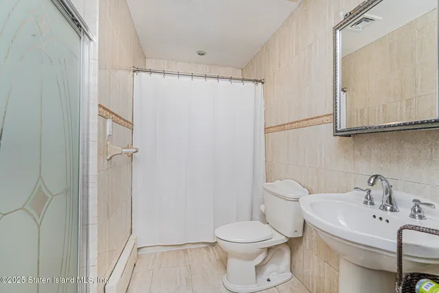 $819,000 | 82 Woods Of Arden Road | Eltingville