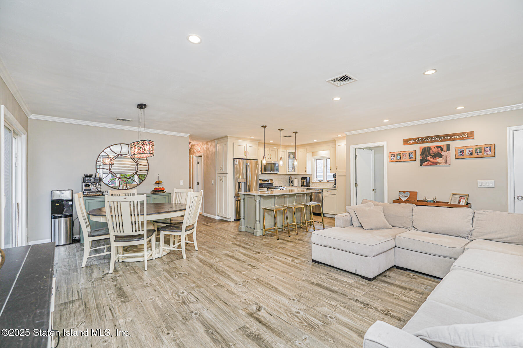82 Woods Of Arden Road Staten Island, NY 10312 - Photo 4 of 30 a living room with furniture and a table