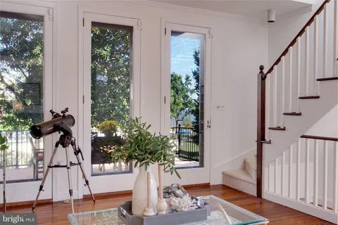 a living room with furniture floor and a fireplace