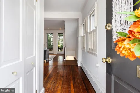 a living room with furniture and windows