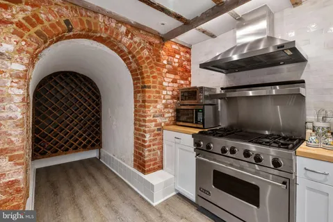a view of a chairs and table in backyard