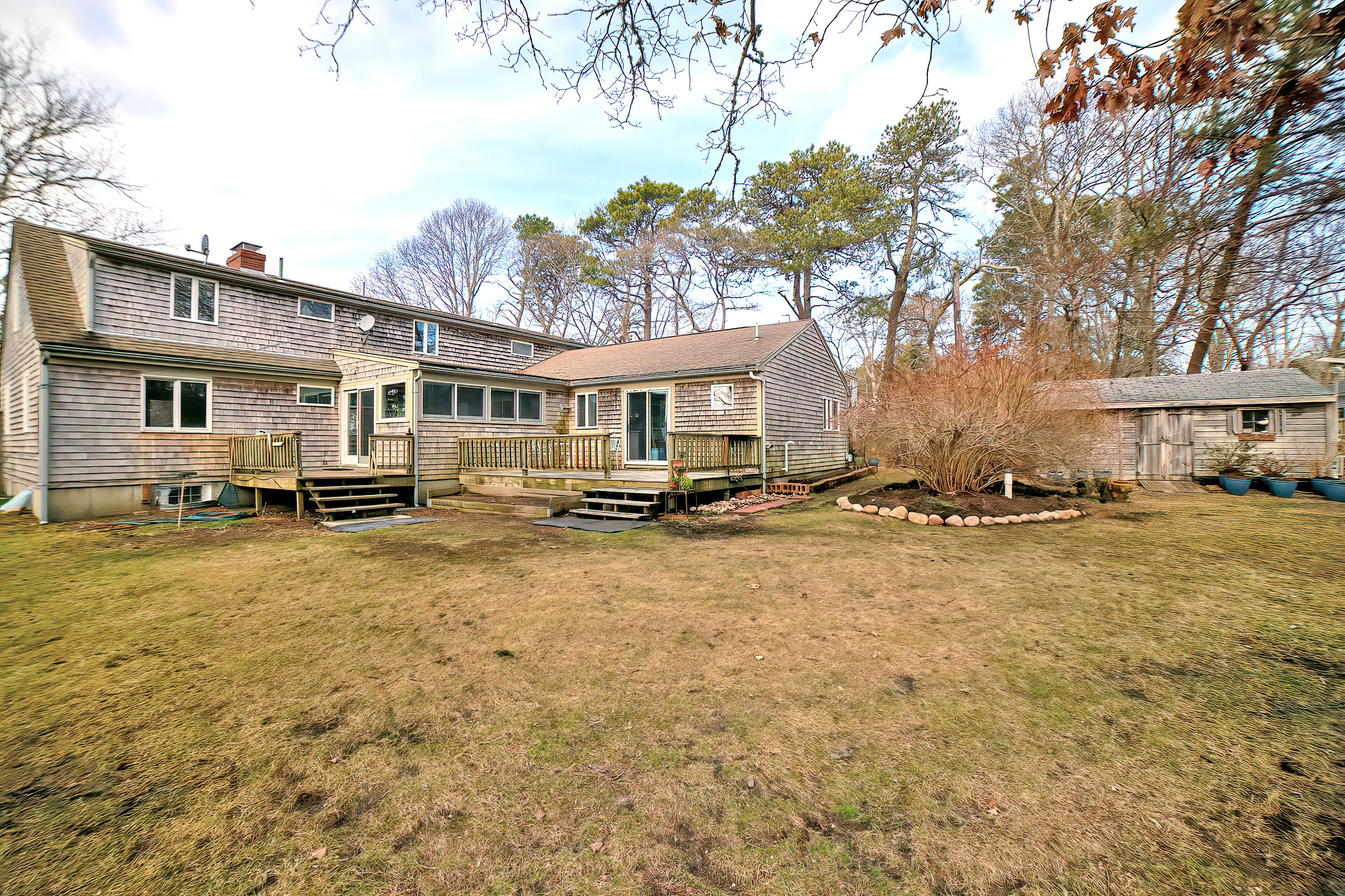 46 Delta Street Hyannis, MA 02601 - Photo 25 of 35 a swimming pool view with a seating space and a garden