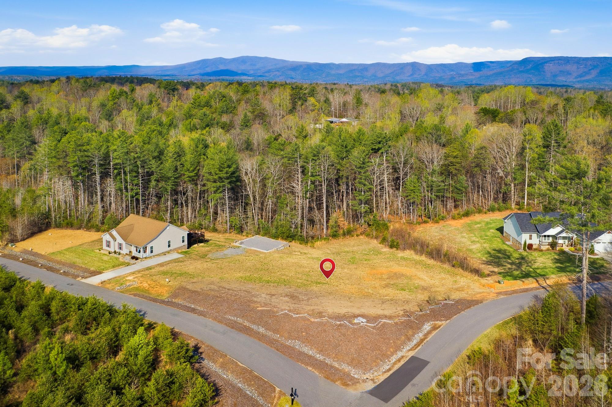 2018 Starlight Lane Morganton, NC 28655 - Photo 2 of 8 a view of a swimming pool with an outdoor space and seating area