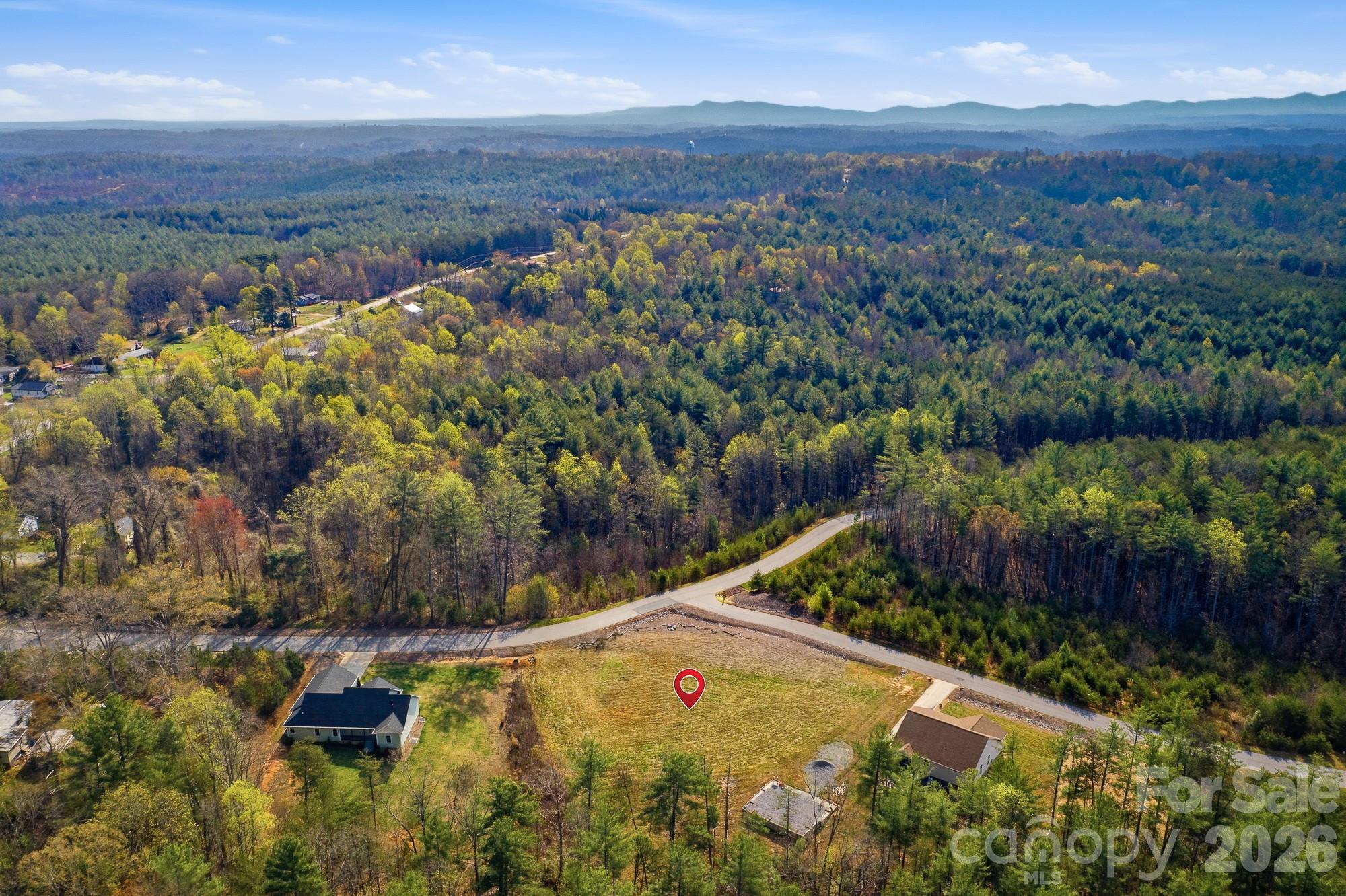 2018 Starlight Lane Morganton, NC 28655 - Photo 3 of 8 a view of a yard with a lake