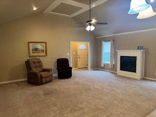 6801 Mosley Street Amarillo, TX 79119 - Photo 2 of 12 a living room with furniture and a fireplace