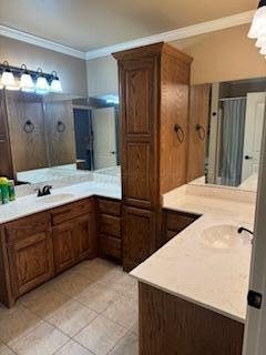 6801 Mosley Street Amarillo, TX 79119 - Photo 8 of 12 a bathroom with a granite countertop sink and a mirror
