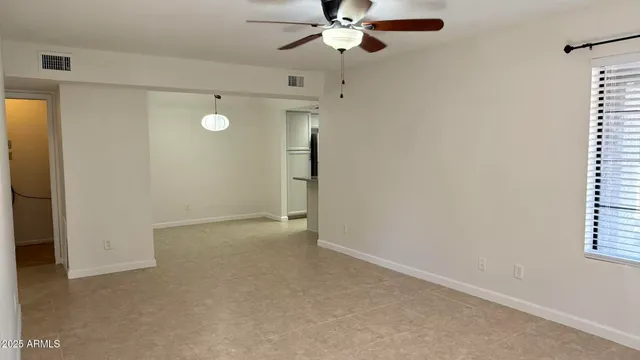 a bathroom with a granite countertop sink and bathtub