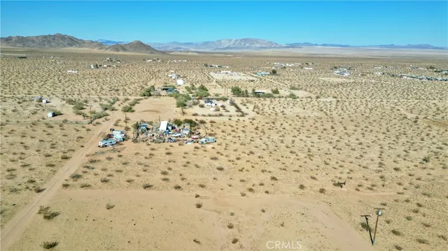 a view of an ocean and a mountain