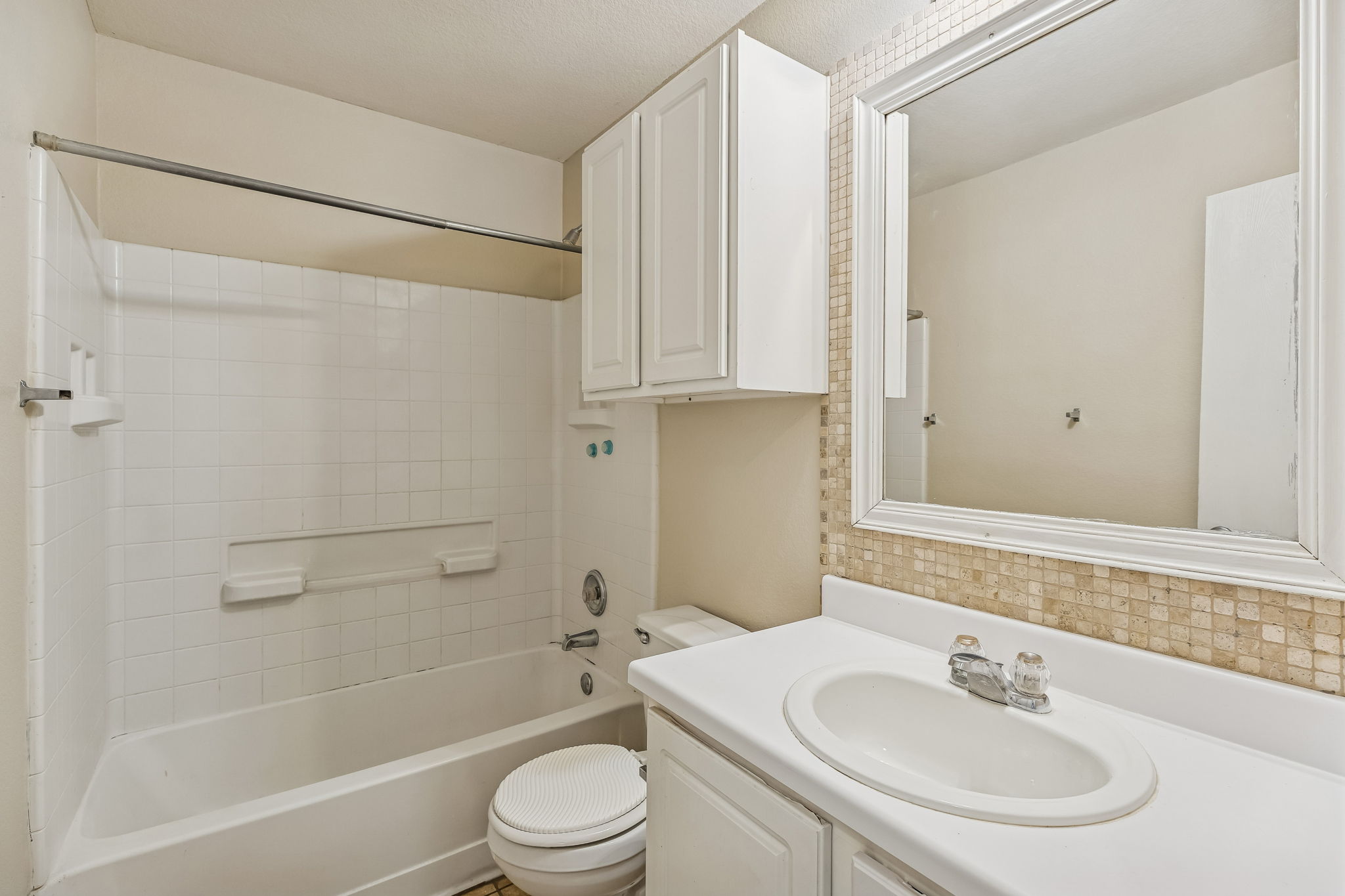 1148 Amberwood Loop Kyle, TX 78640 - Photo 14 of 22 a bathroom with a sink toilet and shower