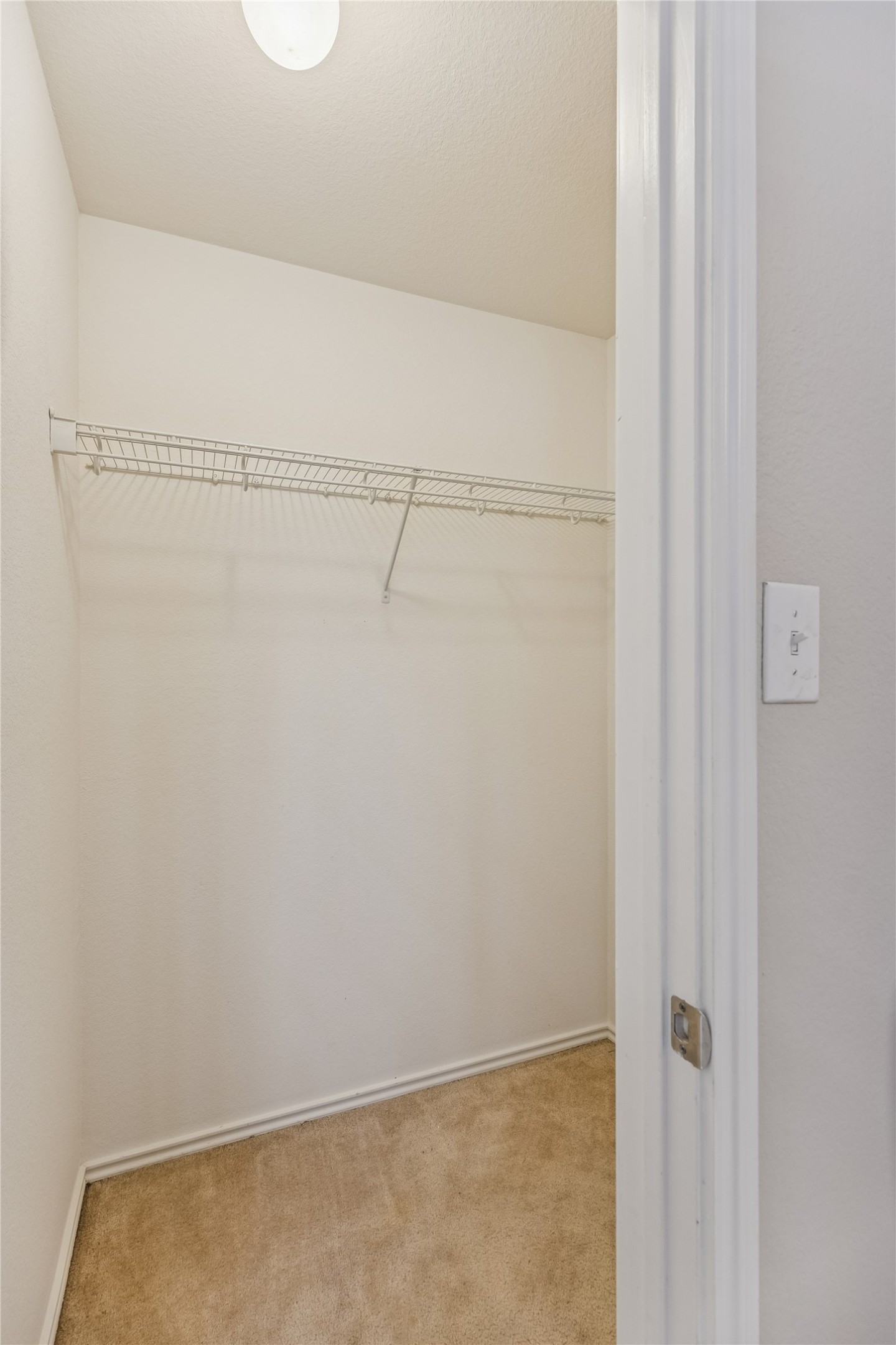 1148 Amberwood Loop Kyle, TX 78640 - Photo 18 of 22 a view of small space with racks on the wall