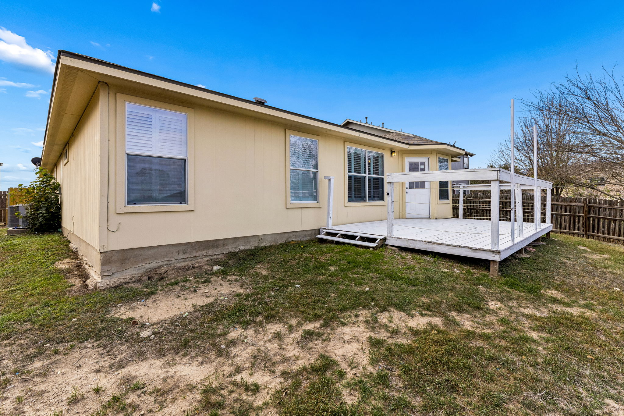 1148 Amberwood Loop Kyle, TX 78640 - Photo 19 of 22 a house view with a garden space