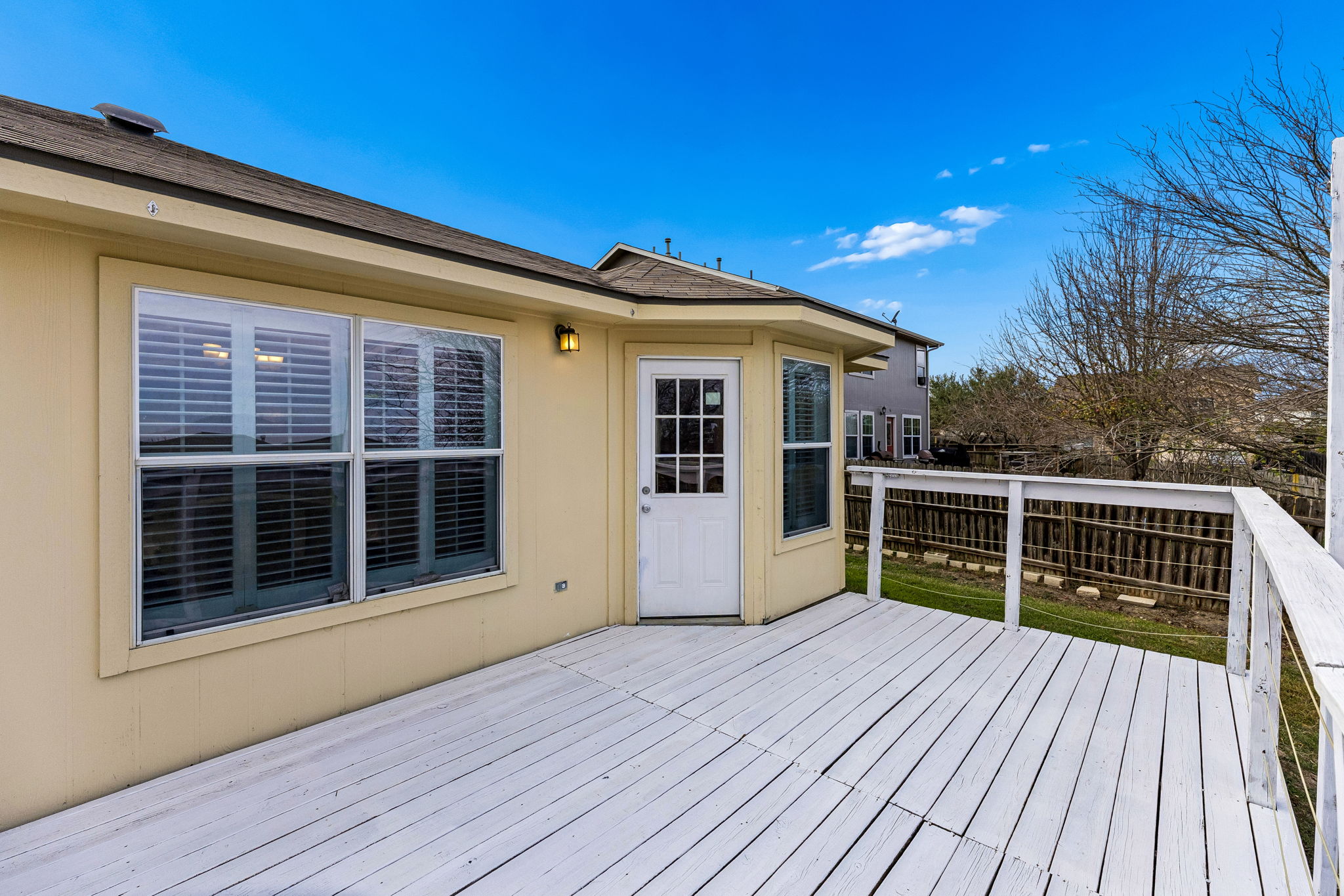 1148 Amberwood Loop Kyle, TX 78640 - Photo 20 of 22 a view of a house with a large window