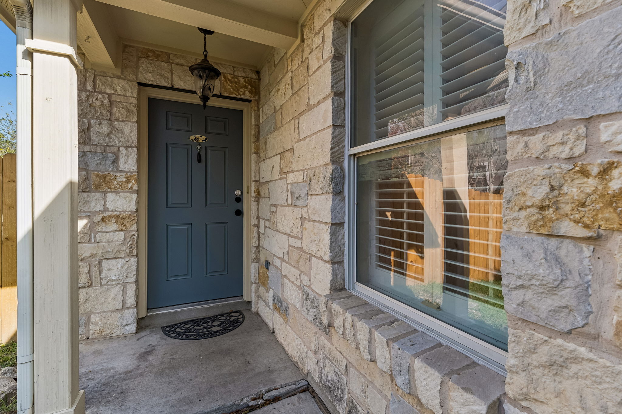 1148 Amberwood Loop Kyle, TX 78640 - Photo 2 of 22 a view of house with a door and wooden door