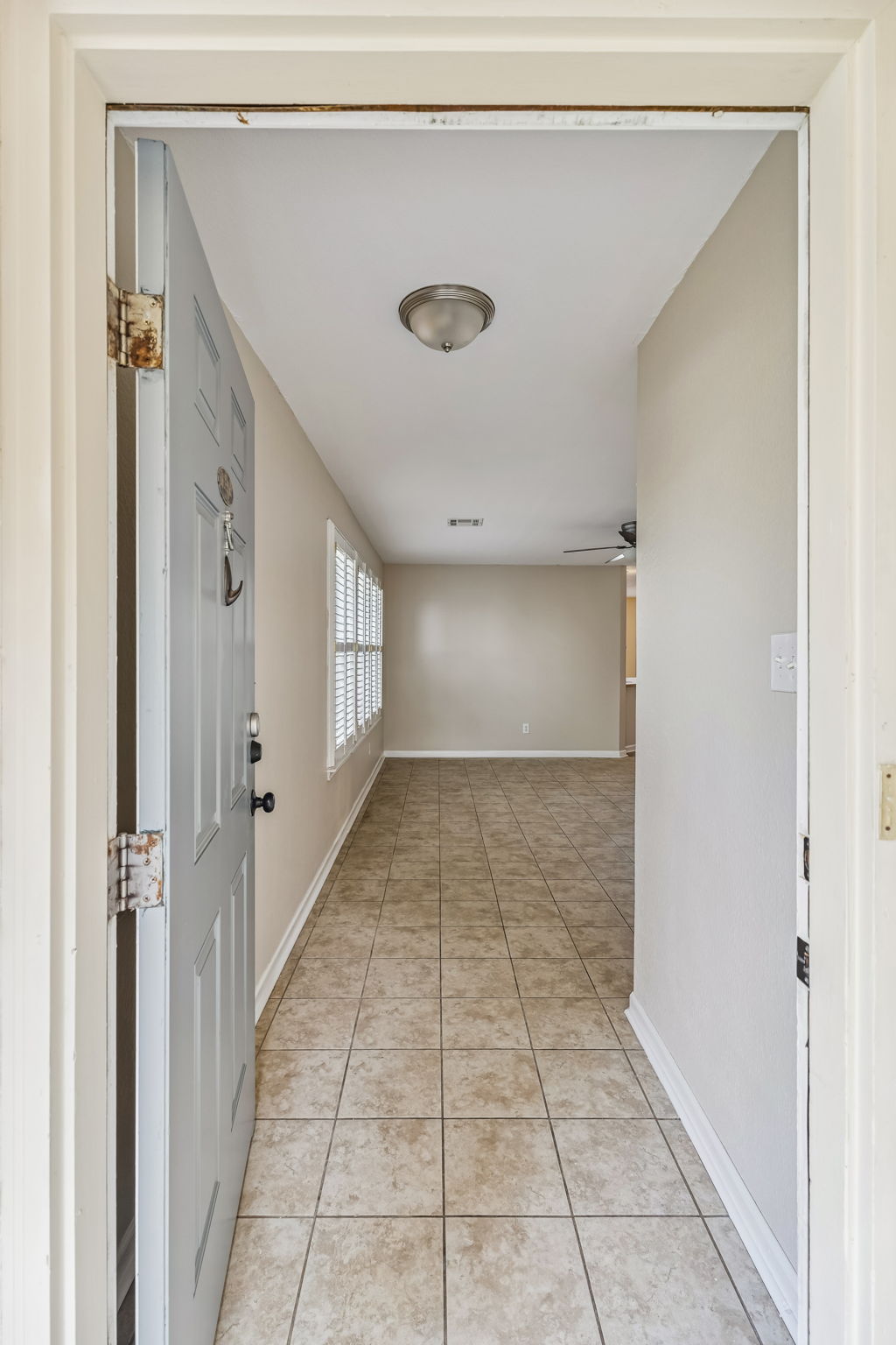 1148 Amberwood Loop Kyle, TX 78640 - Photo 3 of 22 a view of a hallway