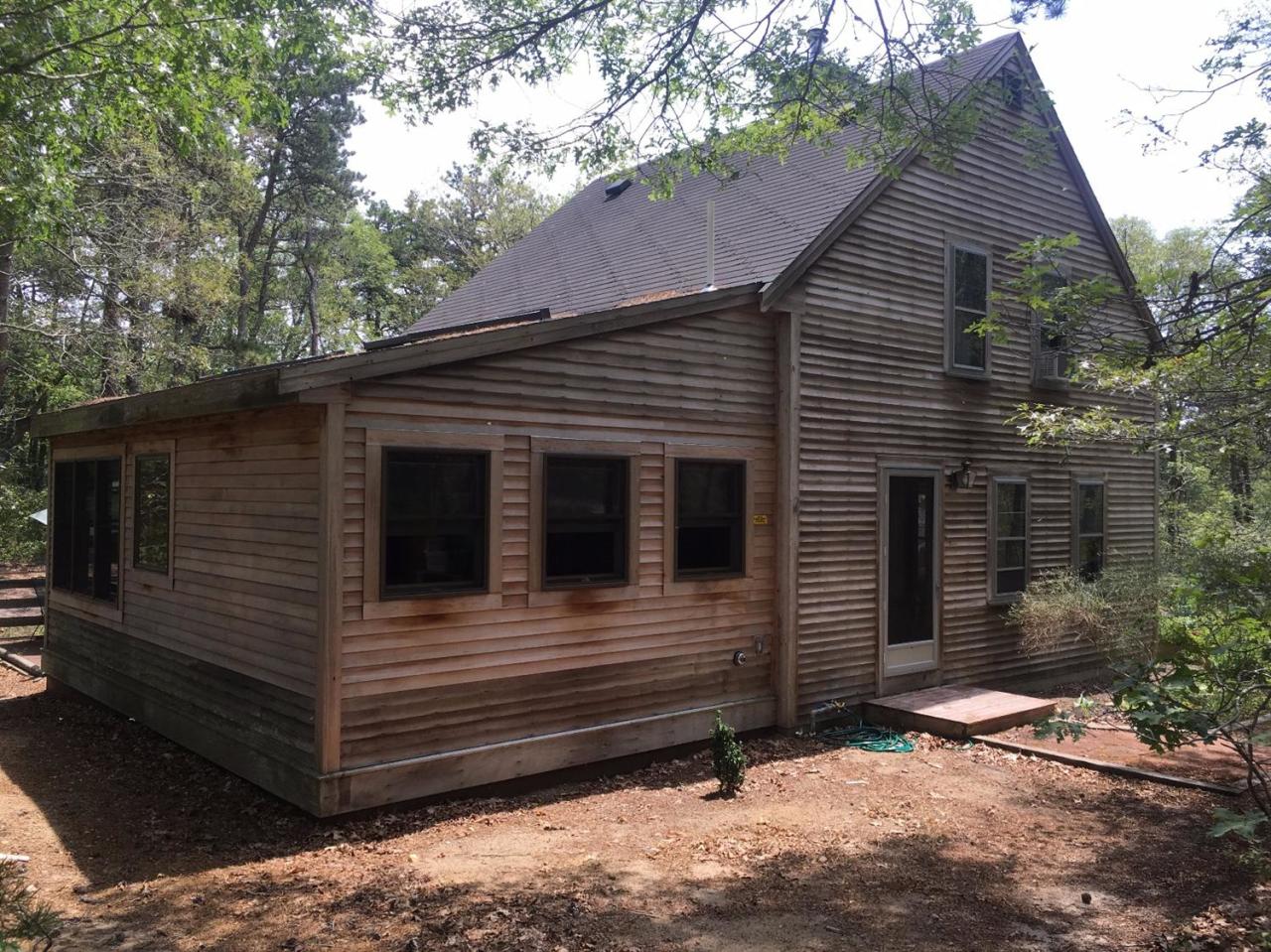 150 Gross Hill Road Wellfleet, MA 02667 - Photo 3 of 31 a view of a house with a yard