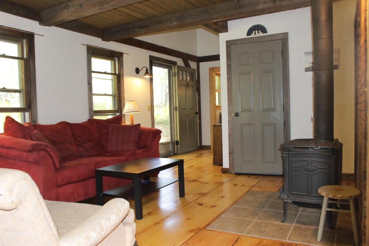 150 Gross Hill Road Wellfleet, MA 02667 - Photo 9 of 31 a living room with furniture and a window