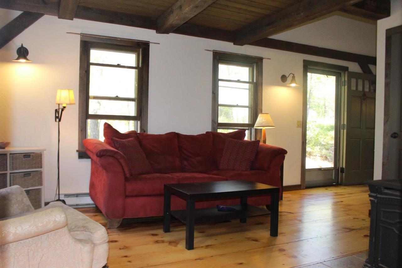 150 Gross Hill Road Wellfleet, MA 02667 - Photo 10 of 31 a living room with furniture and a wooden floor