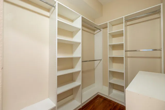 a view of an empty walk in closet
