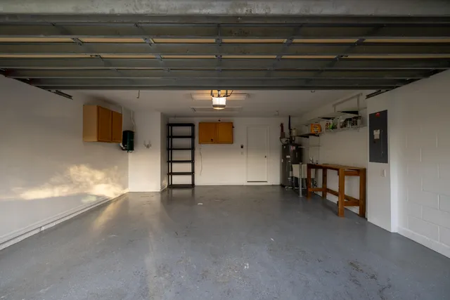 a view of a livingroom with an empty space and a window