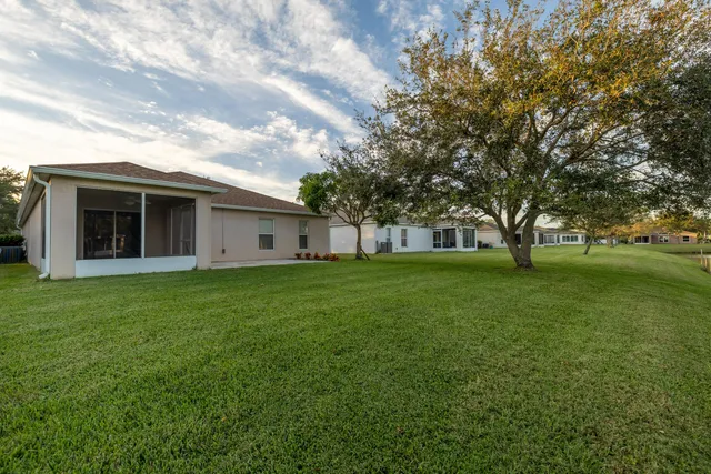 an aerial view of a house swimming pool and outdoor space
