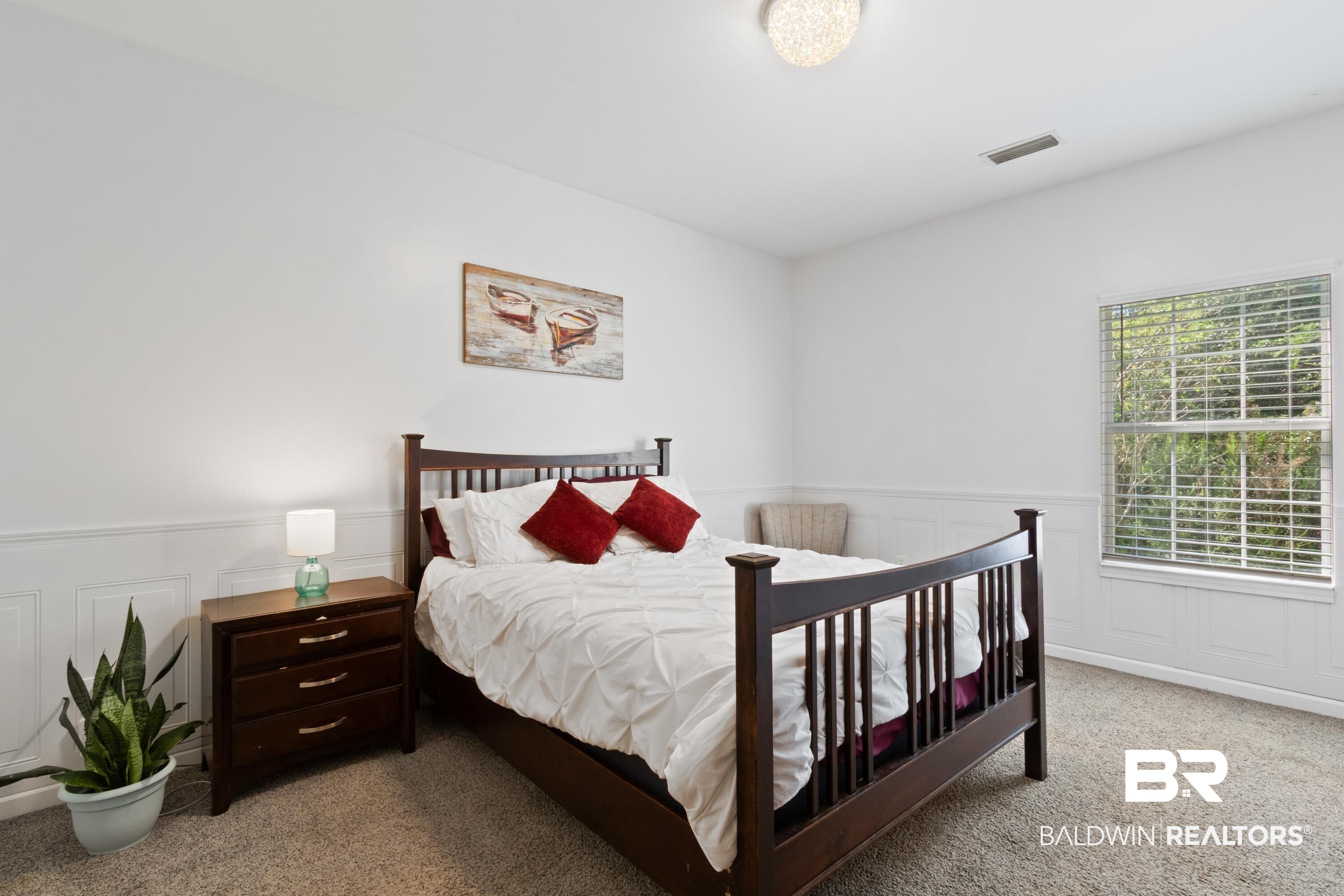 6846 Crimson Ridge Street Gulf Shores, AL 36542 - Photo 21 of 27 Carpeted bedroom with a wainscoted wall