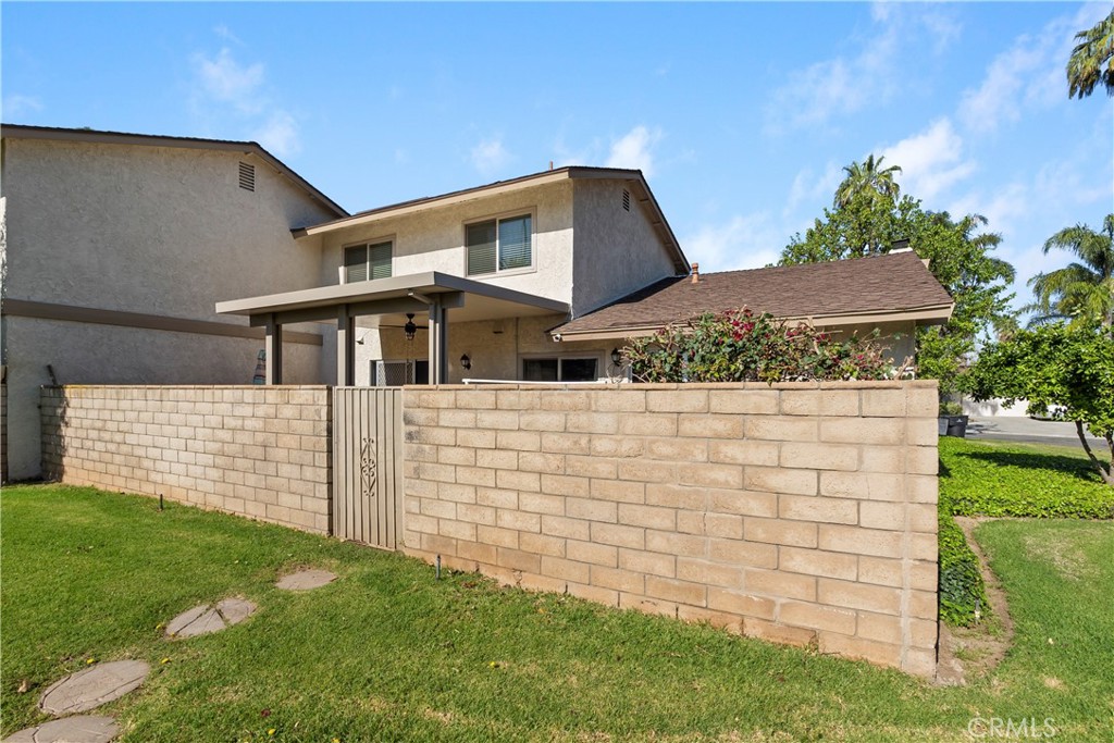 6624 Banyan Place Riverside, CA 92506 - Photo 25 of 41 Private backyard with view of newer patio cover and gate to grounds