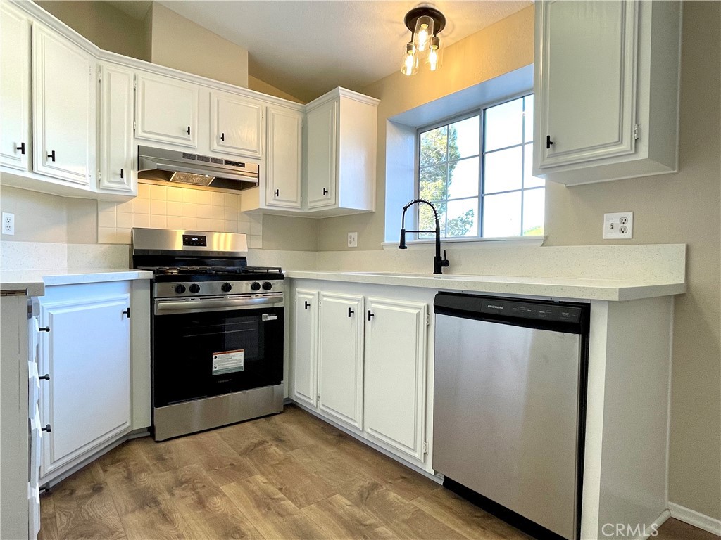 12546 Navajo Road Apple Valley, CA 92308 - Photo 2 of 27 Updated kitchen with new appliances and new fixtures.