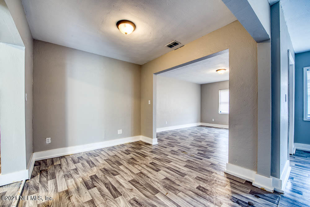 7877 Caxton Circle West Jacksonville, FL 32208 - Photo 3 of 18 a view of an empty room and window