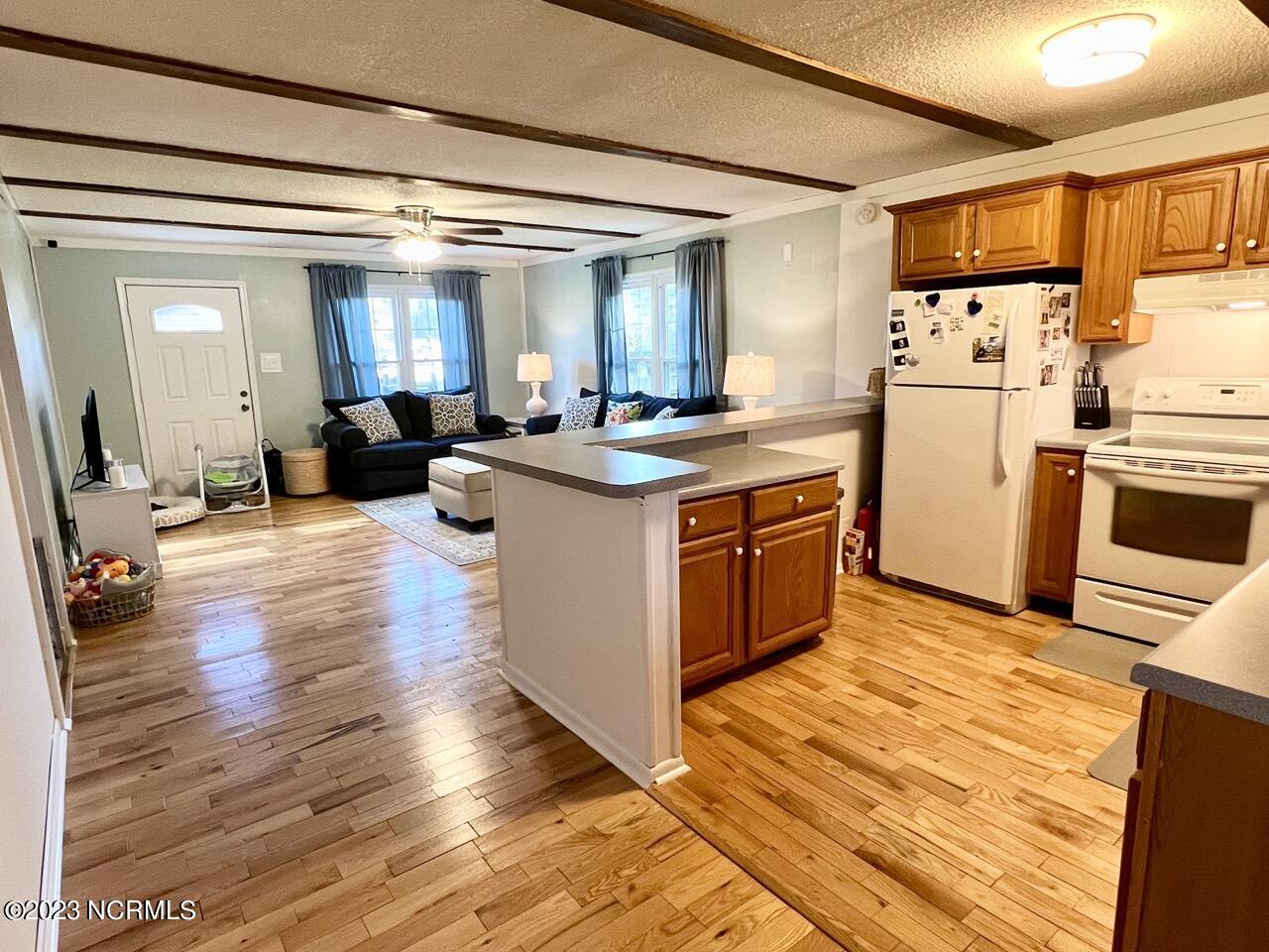 44 Legion Beach Road Columbia, NC 27925 - Photo 3 of 17 Living + Kitchen Area