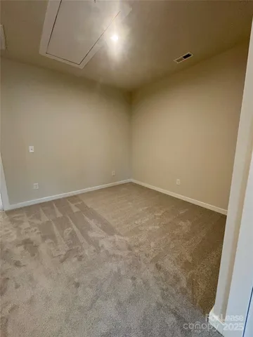 an empty room with a natural light