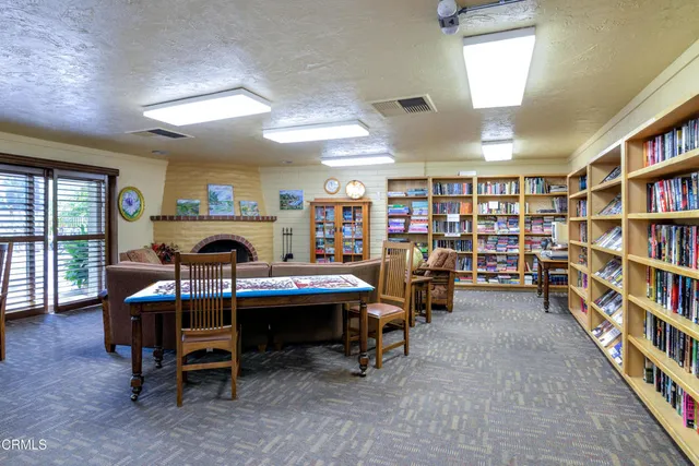 a view of a workspace with furniture