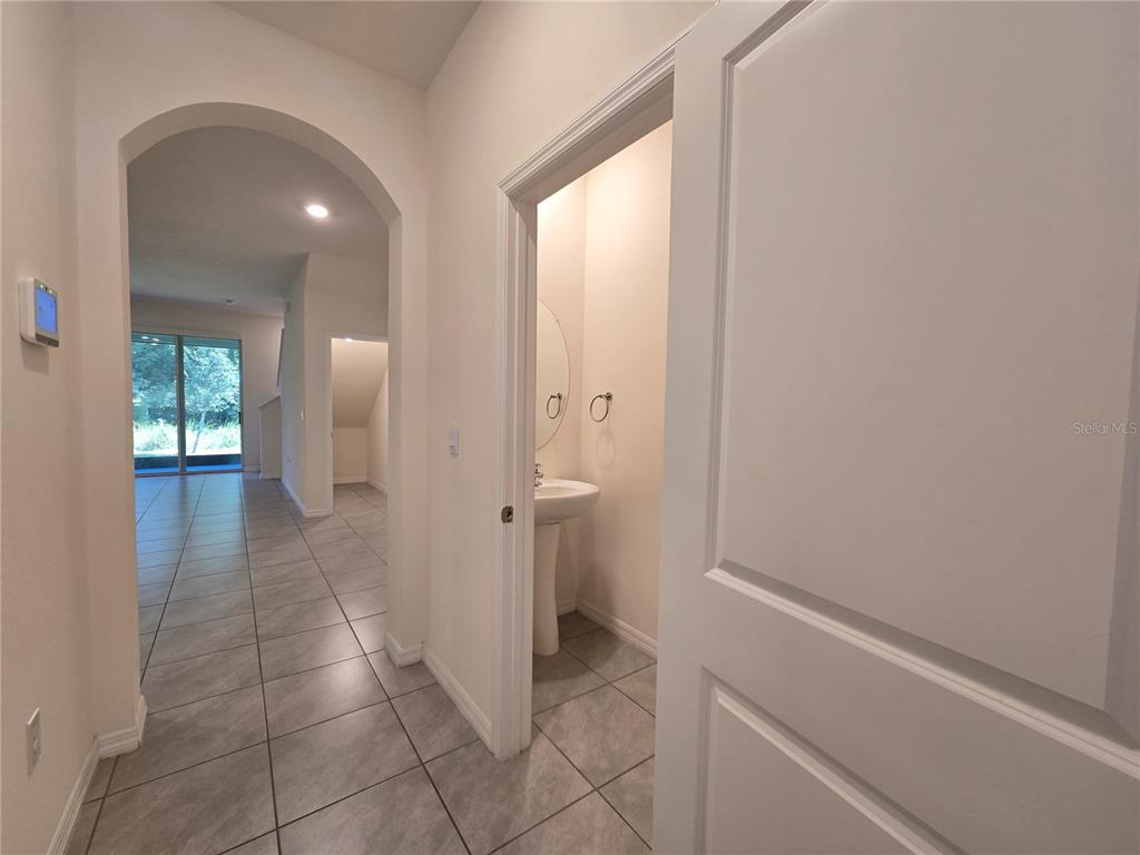 32803 Pez Landing Lane Wesley Chapel, FL 33543 - Photo 6 of 23 a bathroom with a sink and a mirror